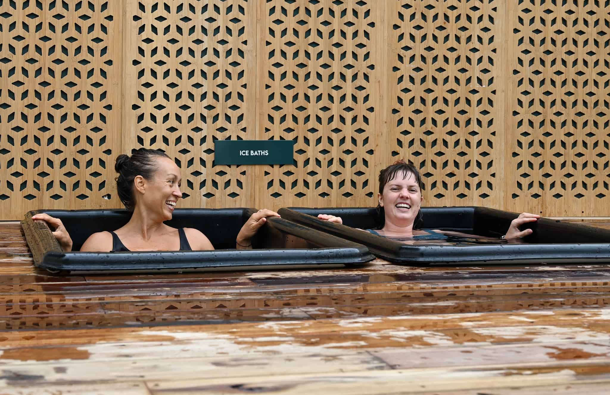 Friends enjoying an ice bath at Vikasati bathhouse in Brisbane
