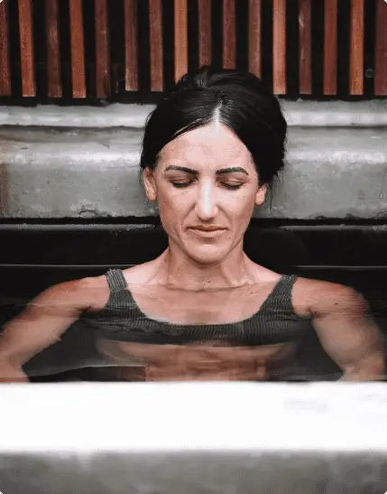 Woman taking Ice Bath