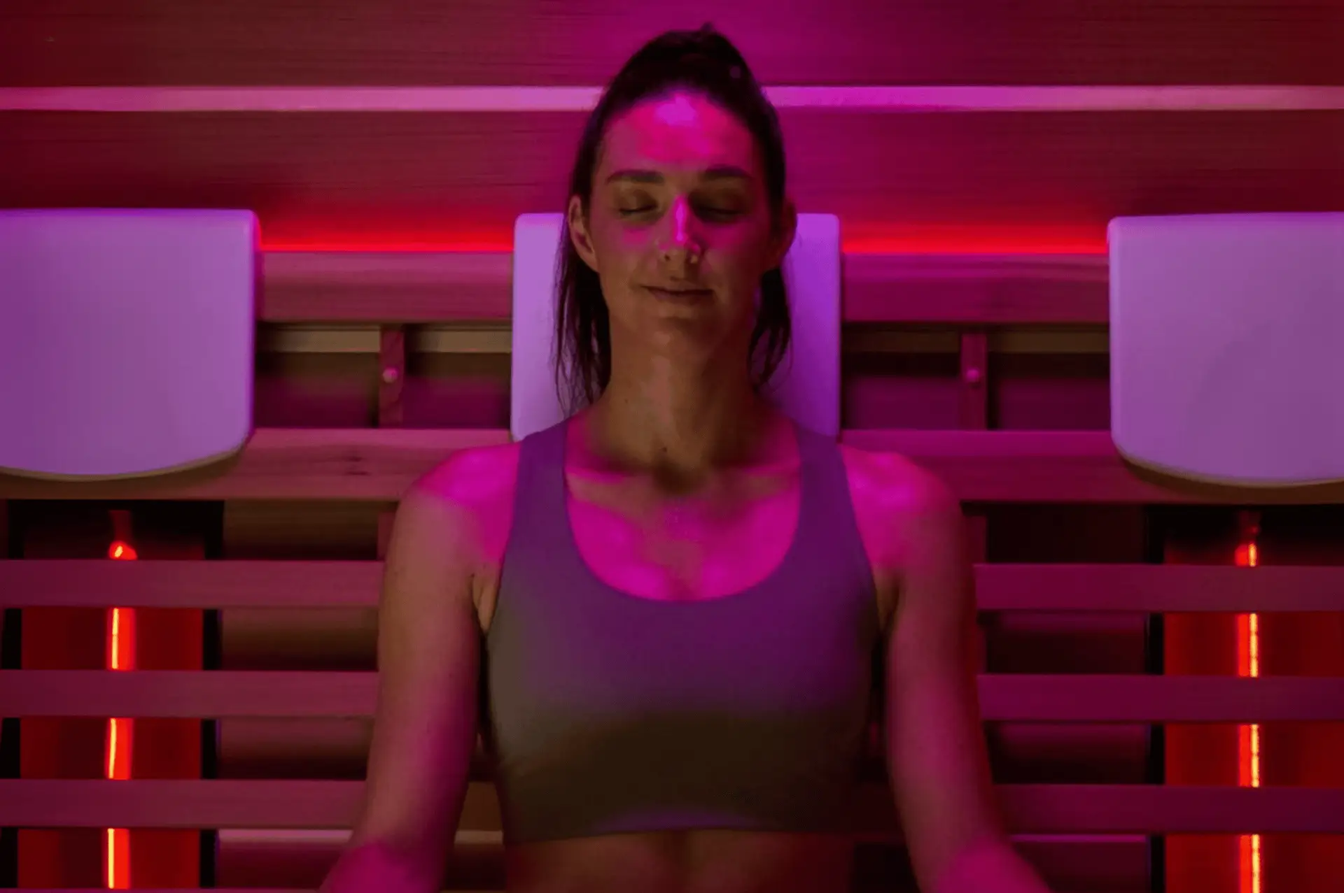 A woman enjoying the benefits of an infrared sauna