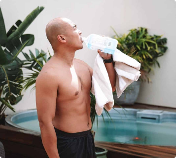 Man drinking water in Vikasati bathhouse