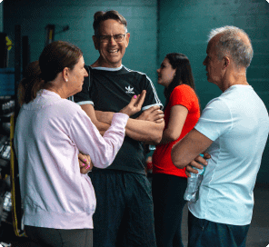 People talking inside the gym